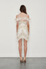 Back view of Thurley Almost Famous mini dress. White dress with intricate beading throughout and tassel detail hem.